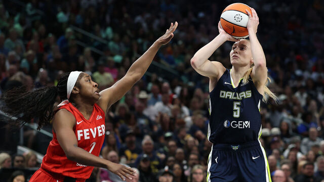 DALLAS, TEXAS - JUNE 27: Paige Bueckers #5 of the Dallas Wings shoots over Aari McDonald #2 of the Indiana Fever during a game at American Airlines Center on June 27, 2025 in Dallas, Texas.