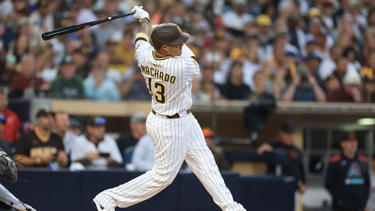 SAN DIEGO, CALIFORNIA - JULY 07: Manny Machado #13 of the San Diego Padres connects for a single during the fourth inning of a game Arizona Diamondbacks at Petco Park on July 07, 2025 in San Diego, California. This was Machado's 2000th career base hit.