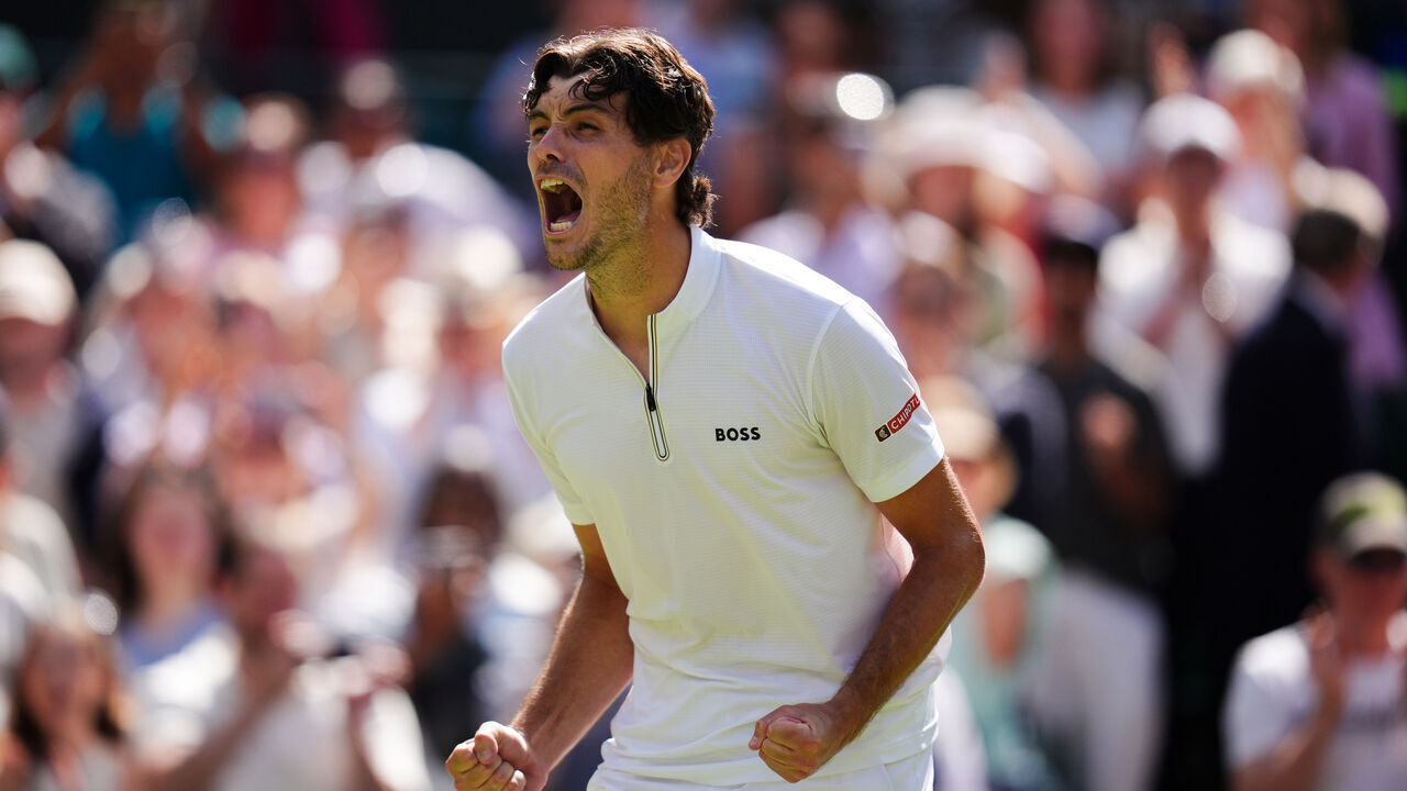 Taylor Fritz celebrates victory over Karen Khachanov following their Gentlemen's Singles match on day nine of the 2025 Wimbledon Championships at the All England Lawn Tennis and Croquet Club, London. Picture date: Tuesday July 8, 2025.