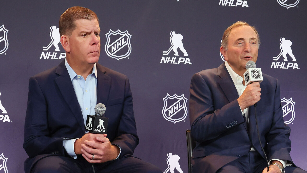 LOS ANGELES, CALIFORNIA - JUNE 27: (l-r) Marty Walsh of the NHLPA along with Gary Bettman of the NHL announce a tentative CBA agreement at Peacock Theater on June 27, 2025 in Los Angeles, California.