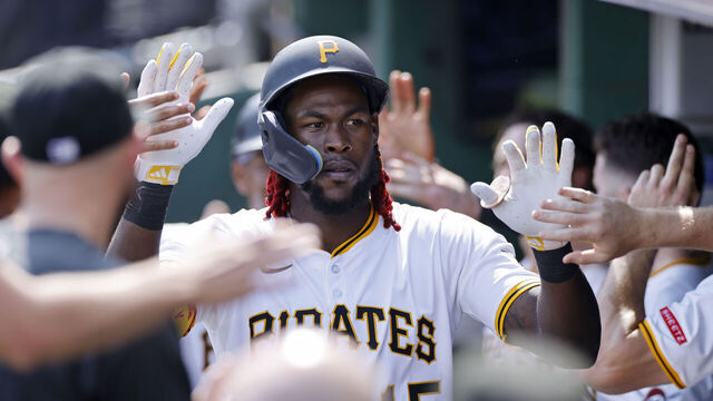 PITTSBURGH, PA - JUNE 29: Oneil Cruz #15 of the Pittsburgh Pirates celebrates with teammates in the dugout after a two-run home run in the seventh inning during an MLB game against the New York Mets on June 29, 2025 at PNC Park in Pittsburgh, Pennsylvania.