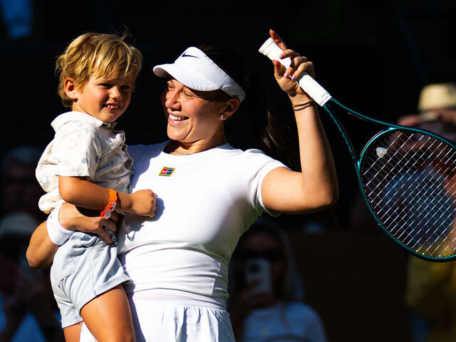 LONDON, ENGLAND - JULY 08: Amanda Anisimova of the United States celebrates with nephew Jackson after defeating Anastasia Pavlyuchenkova in the quarter-final on Day Nine of The Championships Wimbledon 2025 at All England Lawn Tennis and Croquet Club on July 08, 2025 in London, England