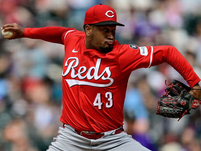 DENVER, COLORADO - APRIL 26: Alexis Diaz #43 of the Cincinnati Reds pitches in the eighth inning against the Colorado Rockies at Coors Field on April 26, 2025 in Denver, Colorado.