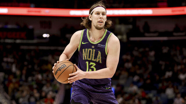 NEW ORLEANS, LOUISIANA - MARCH 9: Kelly Olynyk #13 of the New Orleans Pelicans plays against the Memphis Grizzlies during the first half of a game at the Smoothie King Center on March 9, 2025 in New Orleans, Louisiana.