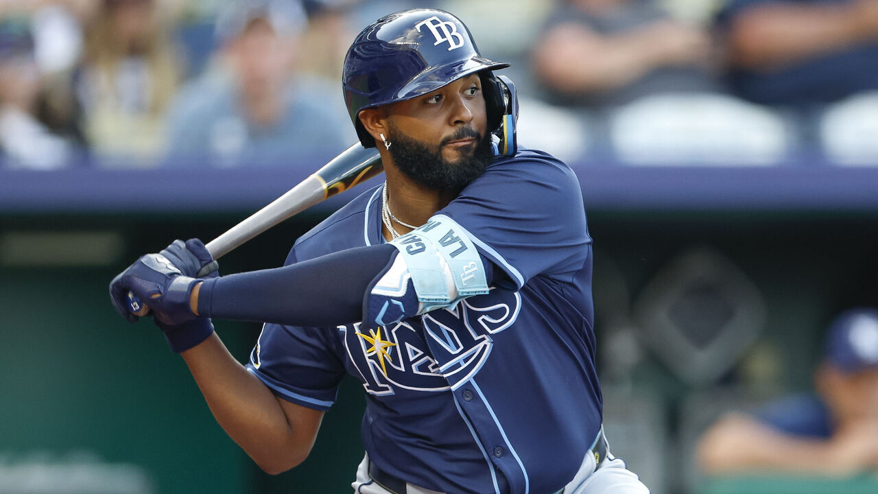 KANSAS CITY, MISSOURI - JUNE 25: Junior Caminero #13 of the Tampa Bay Rays swings the bat in the first inning during a game against the Kansas City Royals at Kauffman Stadium on June 25, 2025 in Kansas City, Missouri.
