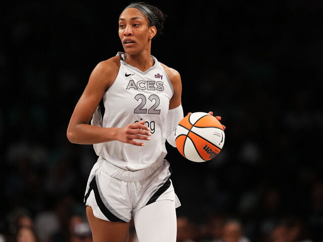 BROOKLYN, NY - JULY 8: A'ja Wilson #22 of the Las Vegas Aces dribbles the ball during the game against the New York Liberty during a WNBA game on July 8, 2025 at Barclays Center Arena in Brooklyn, New York. Mandatory Copyright Notice: Copyright 2025 NBAE