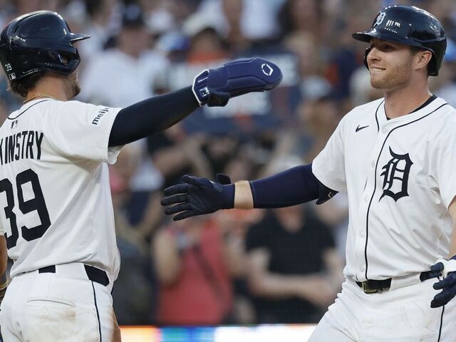 DETROIT, MI - JULY 8: Colt Keith #33 of the Detroit Tigers celebrates with Zach McKinstry #39 of the Detroit Tigers after hitting a two-run home run against the Tampa Bay Rays during the seventh inning at Comerica Park on July 8, 2025 in Detroit, Michigan.