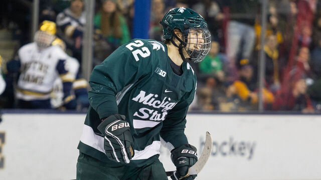 SOUTH BEND, IN - FEBRUARY 2: Isaac Howard #22 of Michigan State is all smiles after scoring a goal during a game between Michigan State University and University of Notre Dame at Compton Family Ice Arena on February 2, 2024 in South Bend, Indiana.
