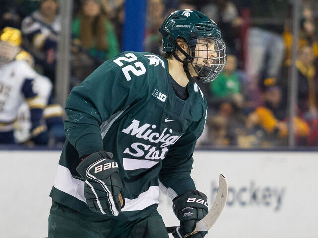 SOUTH BEND, IN - FEBRUARY 2: Isaac Howard #22 of Michigan State is all smiles after scoring a goal during a game between Michigan State University and University of Notre Dame at Compton Family Ice Arena on February 2, 2024 in South Bend, Indiana.