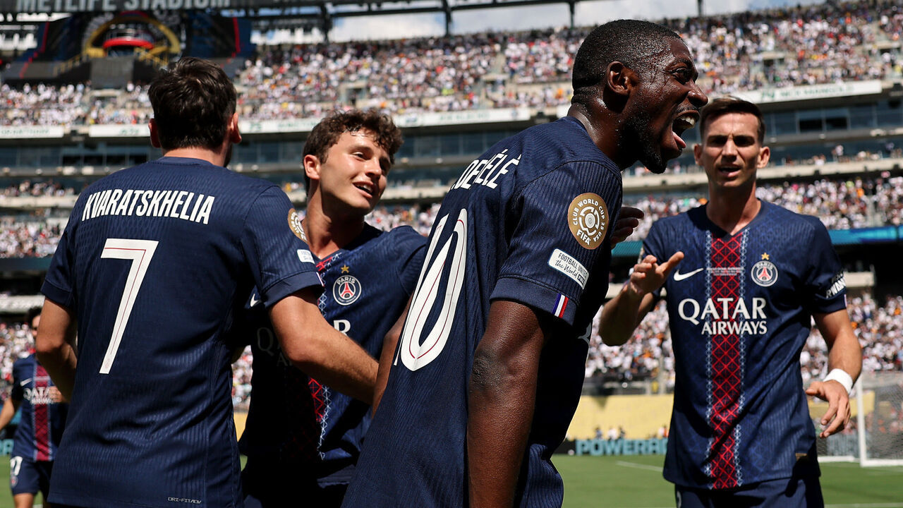EAST RUTHERFORD, NEW JERSEY - JULY 09: Ousmane Dembele #10 of Paris Saint-Germain celebrates scoring his team's second goal with teammates during the FIFA Club World Cup 2025 semi-final match between Paris Saint-Germain and Real Madrid CF at MetLife Stadium on July 09, 2025 in East Rutherford, New Jersey.