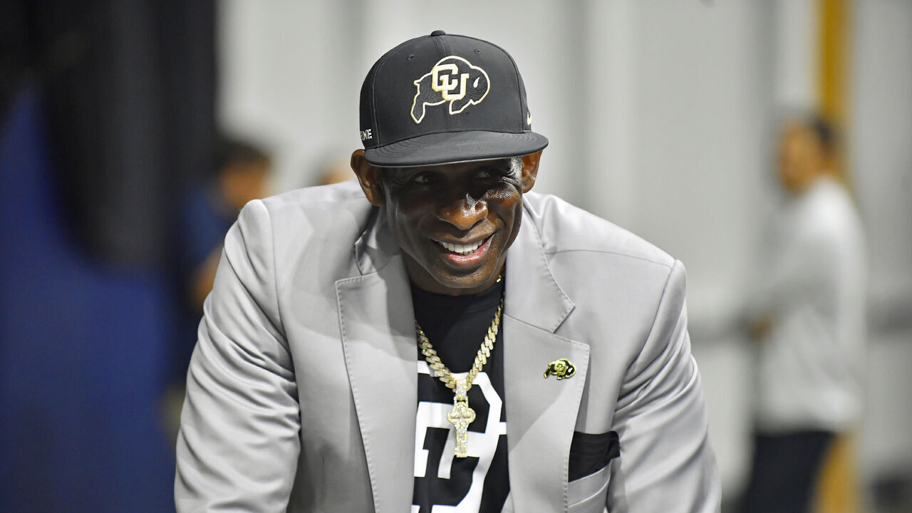 FRISCO, TX - JULY 09: Colorado Buffaloes coach Deion Sanders gets ready before taking the stage to talk during day two of Big 12 Media Days on Wednesday, July 09, 2025 at the Ford Center at The Star in Frisco, TX.