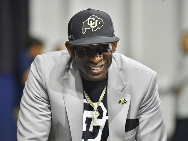 FRISCO, TX - JULY 09: Colorado Buffaloes coach Deion Sanders gets ready before taking the stage to talk during day two of Big 12 Media Days on Wednesday, July 09, 2025 at the Ford Center at The Star in Frisco, TX.