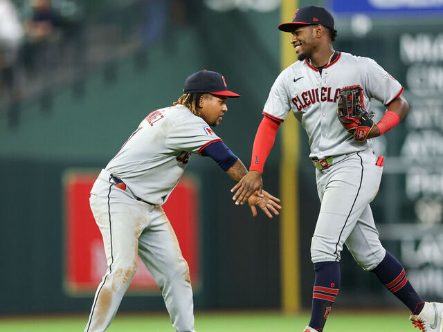 HOUSTON, TEXAS - JULY 09: Jose Ramirez #11 of the Cleveland Guardians congratulates Angel Martinez #1 after defeating the Houston Astros at Daikin Park on July 09, 2025 in Houston, Texas.