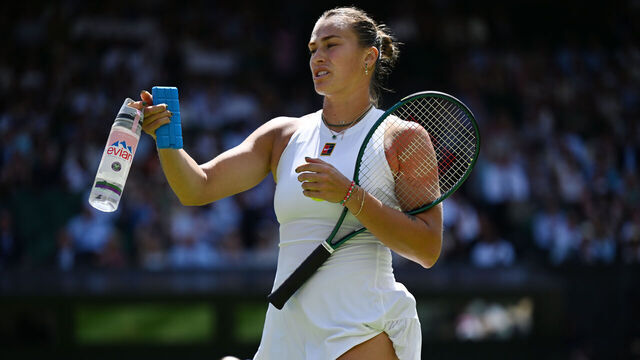LONDON, ENGLAND - JULY 10: Aryna Sabalenka holds a bottle of water and an ice pack in her hand during the Ladies' Singles semi-final match against Amanda Anisimova of United States on day eleven of The Championships Wimbledon 2025 at All England Lawn Tennis and Croquet Club on July 10, 2025 in London, England.