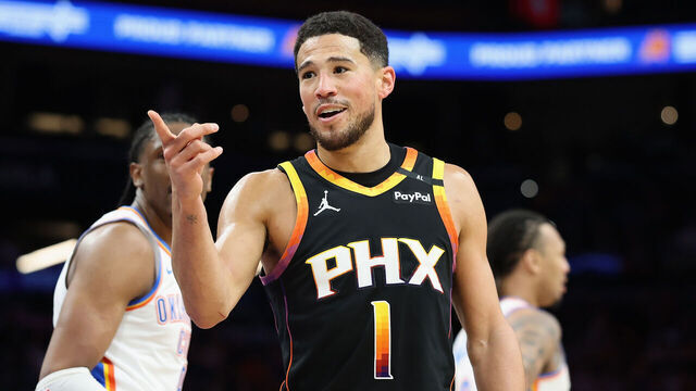 PHOENIX, ARIZONA - APRIL 09: Devin Booker #1 of the Phoenix Suns reacts during the second half of the NBA game at PHX Arena on April 09, 2025 in Phoenix, Arizona.