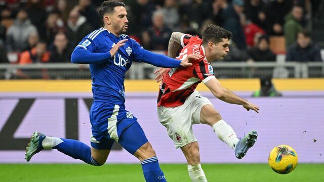 AC Milan's Christian Pulisic R scores during a Serie A football match between AC Milan and Como in Milan, Italy, March 15, 2025.