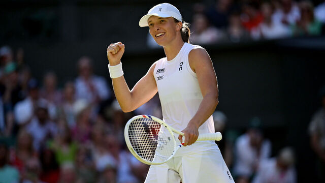 LONDON, ENGLAND - JULY 10: Iga Swiatek of Poland celebrates winning match point against Belinda Bencic of Switzerland during the Ladies' Singles semi-final match on day eleven of The Championships Wimbledon 2025 at All England Lawn Tennis and Croquet Club on July 10, 2025 in London, England.