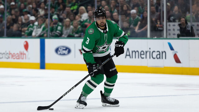 DALLAS, TEXAS - APRIL 12: Mathew Dumba #3 of the Dallas Stars controls the puck during the first period against the Utah Hockey Club at American Airlines Center on April 12, 2025 in Dallas, Texas.
