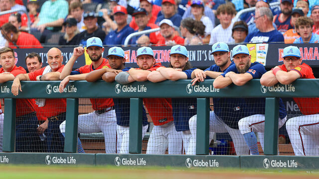 ATLANTA, GA - JULY 04: Several Braves watch the game from the top of the dugout during the MLB game between the Baltimore Orioles and the Atlanta Braves played on the 4th of July 2025 at Truist Park in Atlanta, Georgia.