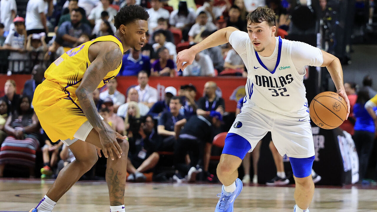 LAS VEGAS, NEVADA - JULY 10: Cooper Flagg #32 of the Dallas Mavericks drives against DaJuan Gordon #45 of the Los Angeles Lakers in the second half of a 2025 NBA Summer League game at the Thomas & Mack Center on July 10, 2025 in Las Vegas, Nevada.