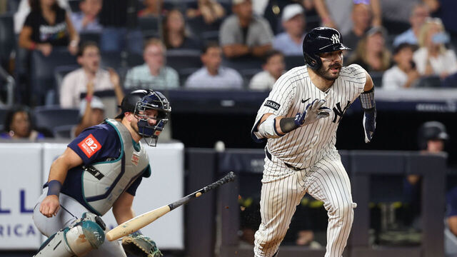 NEW YORK, NY - JULY 10: Austin Wells #28 of the New York Yankees hits a single during the game against the Seattle Mariners at Yankee Stadium on July 10, 2025 in New York City.