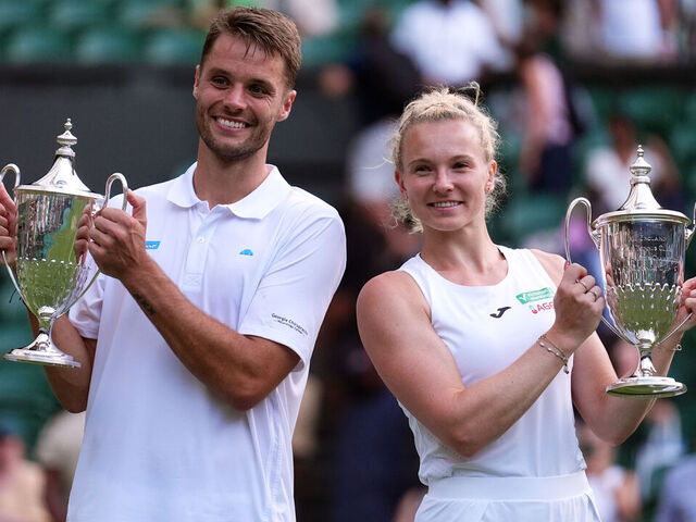 Sem Verbeek and Katerina Siniakova with their trophies following their Mixed Doubles Final victory over Joe Salisbury and Luisa Stefani on day eleven of the 2025 Wimbledon Championships at the All England Lawn Tennis and Croquet Club, London. Picture date: Thursday July 10, 2025.
