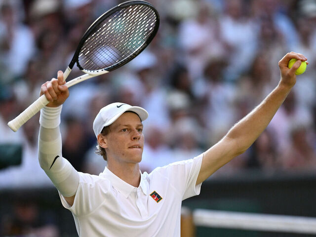 LONDON, ENGLAND - JULY 11: Jannik Sinner of Italy celebrates winning match point against Novak Djokovic of Serbia during the Gentlemen's Singles semi-final match on day twelve of The Championships Wimbledon 2025 at All England Lawn Tennis and Croquet Club on July 11, 2025 in London, England.