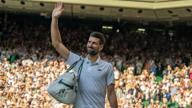 LONDON, ENGLAND - JULY 11: Novak Djokovic of Serbia waves to the crowd as he leaves the Centre Court after his Gentlemen's semi-final defeat by Jannik Sinner of Italy on Day 12 of Championships, Wimbledon 2025 at The All England Lawn Tennis And Croquet Club on July 11, 2025, in London, England.