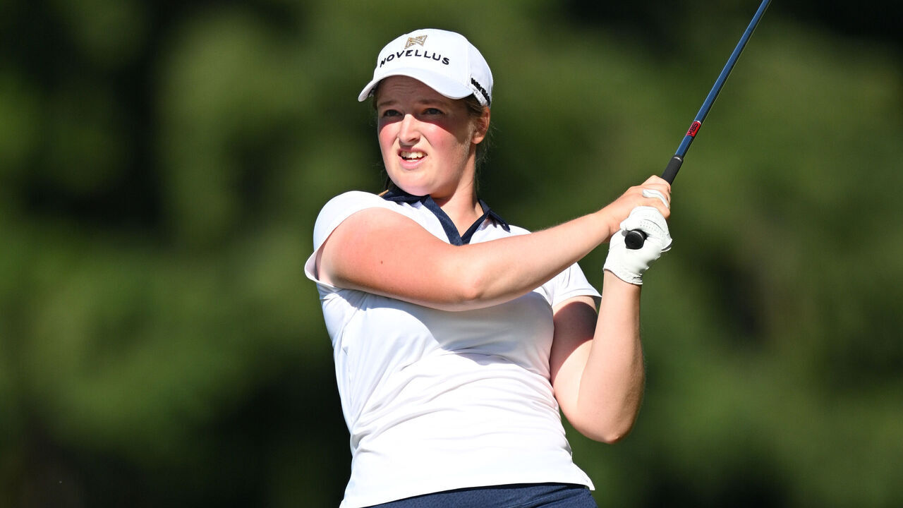 EVIAN-LES-BAINS, FRANCE - JULY 11: Lottie Woad of England plays her second shot on the 18th hole during Round Two of The Amundi Evian Championship 2025 at Evian Resort Golf Club on July 11, 2025 in Evian-les-Bains, France.