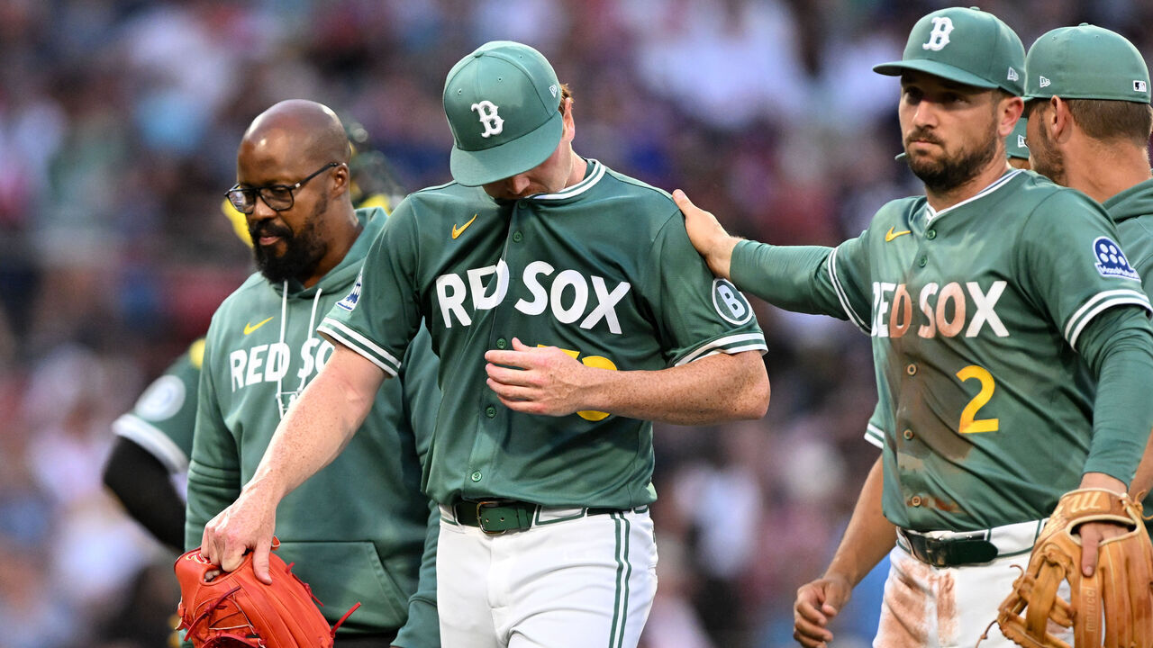 BOSTON, MASSACHUSETTS - JULY 11: Hunter Dobbins #73 of the Boston Red Sox walks off of the field during the second inning of a game against the Tampa Bay Rays at Fenway Park on July 11, 2025 in Boston, Massachusetts.