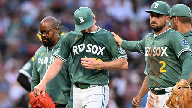 BOSTON, MASSACHUSETTS - JULY 11: Hunter Dobbins #73 of the Boston Red Sox walks off of the field during the second inning of a game against the Tampa Bay Rays at Fenway Park on July 11, 2025 in Boston, Massachusetts.