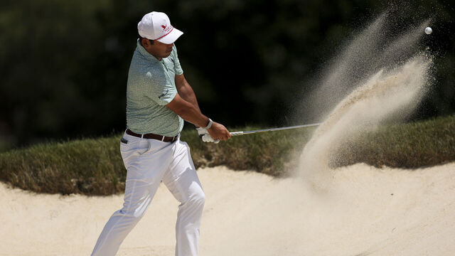 LOUISVILLE, KENTUCKY - JULY 11: Chan Kim hits out of a greenside bunker on the 12th hole during the second round of the ISCO Championship 2025 at Hurstbourne Country Club on July 11, 2025 in Louisville, Kentucky.