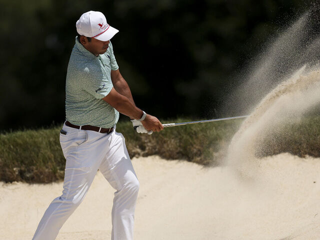LOUISVILLE, KENTUCKY - JULY 11: Chan Kim hits out of a greenside bunker on the 12th hole during the second round of the ISCO Championship 2025 at Hurstbourne Country Club on July 11, 2025 in Louisville, Kentucky.