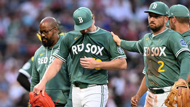 BOSTON, MASSACHUSETTS - JULY 11: Hunter Dobbins #73 of the Boston Red Sox walks off of the field during the second inning of a game against the Tampa Bay Rays at Fenway Park on July 11, 2025 in Boston, Massachusetts.