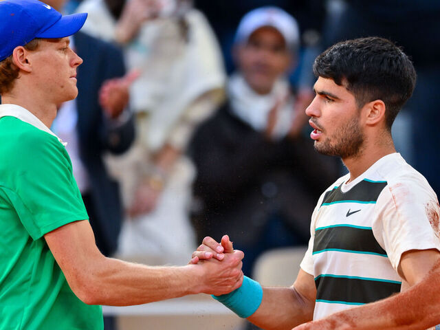 PARIS, FRANCE - JUNE 08: Carlos Alcaraz of Spain shakes hands with Jannik Sinner of Italy following the Men’s Singles Final match on Day Fifteen of the 2025 French Open at Roland Garros on June 08, 2025 in Paris, France.