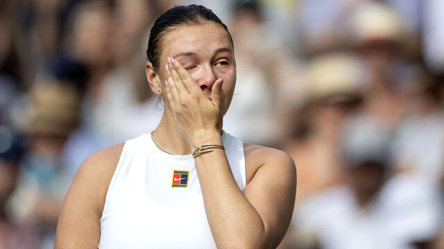LONDON, ENGLAND - JULY 12: Amanda Anisimova of the United States in tears at the presentation ceremony after her 6-0 6-0 loss against Iga Swiatek of Poland in the Final of the Women's Singles Competition on Centre Court during the Wimbledon Lawn Tennis Championships at the All England Lawn Tennis and Croquet Club at Wimbledon on July 12th, 2025, in London, England.