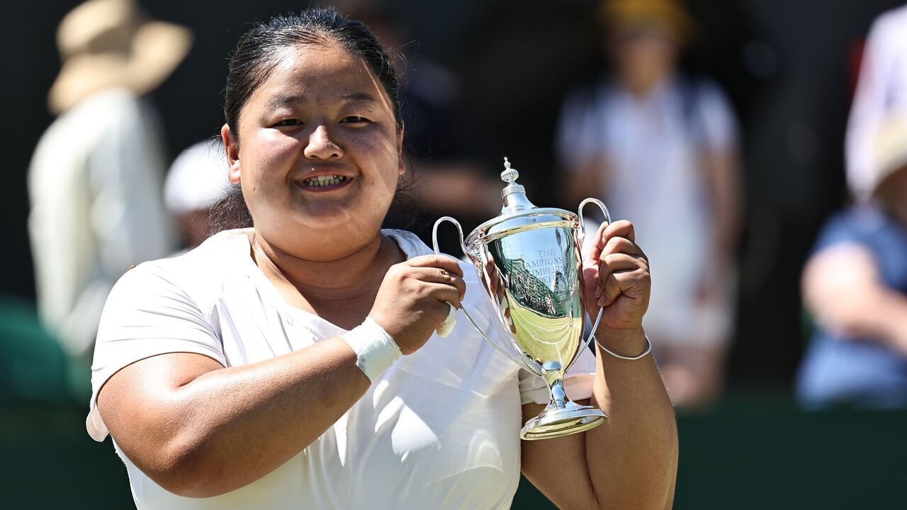 LONDON, ENGLAND - JULY 12: Wang Ziying of China celebrates winning the Ladies' Wheelchair Singles Final against Yui Kamiji of Japan on day thirteen of 2025 Wimbledon Championships at All England Lawn Tennis and Croquet Club on July 12, 2025 in London, England.