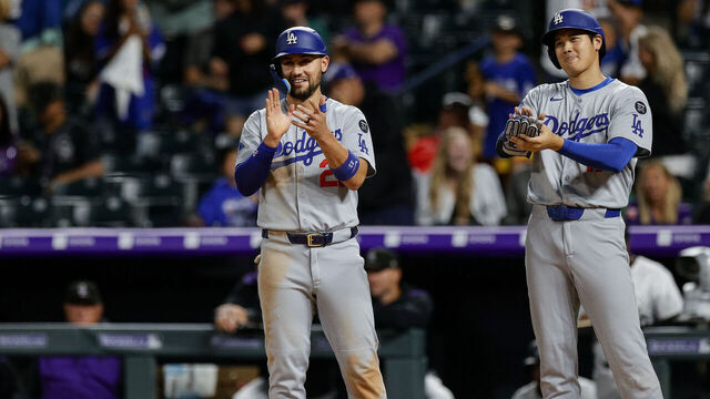 DENVER, CO - JUNE 25: Michael Conforto #23 and Shohei Ohtani #17 of the Los Angeles Dodgers celebrates after Max Muncy #13 of the Los Angeles Dodgers hit a grand slam in the seventh inning during the game between the Los Angeles Dodgers and the Colorado Rockies at Coors Field on Wednesday, June 25, 2025 in Denver, Colorado.