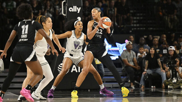 LAS VEGAS, NV - JULY 12: A'ja Wilson #22 of the Las Vegas Aces handles the ball during the game against the Golden State Valkyries during a WNBA game on July 12, 2025 at Michelob ULTRA Arena in Las Vegas, Nevada. Mandatory Copyright Notice: Copyright 2025 NBAE
