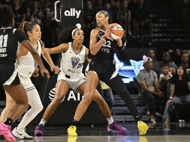 LAS VEGAS, NV - JULY 12: A'ja Wilson #22 of the Las Vegas Aces handles the ball during the game against the Golden State Valkyries during a WNBA game on July 12, 2025 at Michelob ULTRA Arena in Las Vegas, Nevada. Mandatory Copyright Notice: Copyright 2025 NBAE