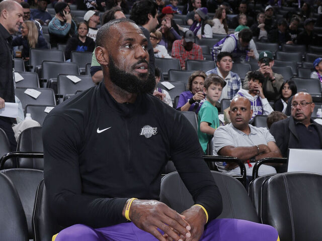 SACRAMENTO, CA - DECEMBER 21: LeBron James #23 of the Los Angeles Lakers looks on from the bench prior to the game against the Sacramento Kings on December 21, 2024 at Golden 1 Center in Sacramento, California. NOTE TO USER: User expressly acknowledges and agrees that, by downloading and or using this photograph, User is consenting to the terms and conditions of the Getty Images Agreement. Mandatory Copyright Notice: Copyright 2024 NBAE
