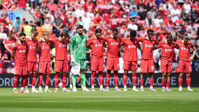 Liverpool players stand for a minutes silence in memory of Liverpool player Diogo Jota ahead of the pre-season friendly match at Deepdale Stadium, Preston. Liverpool remain in mourning following the death of Portugal forward Jota, 28, and his brother Andre Silva, 25, in a car crash in Zamora, Spain, on July 3. Picture date: Sunday July 13, 2025.