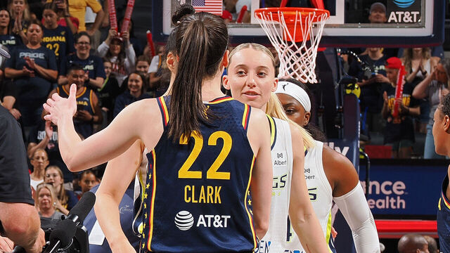INDIANAPOLIS, IN - JULY 13: Paige Bueckers #5 of the Dallas Wings and Caitlin Clark #22 of the Indiana Fever embrace before the game on July 13, 2025 at Gainbridge Fieldhouse in Indianapolis, Indiana. Mandatory Copyright Notice: Copyright 2025 NBAE