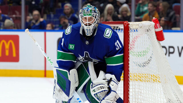VANCOUVER, CANADA - MARCH 15: Arturs Silovs #31 of the Vancouver Canucks in net during the third period of their NHL game against the Chicago Blackhawks at Rogers Arena on March 15, 2025 in Vancouver, British Columbia, Canada.