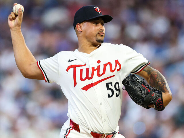 MINNEAPOLIS, MINNESOTA - JULY 09: Jhoan Duran #59 of the Minnesota Twins delivers a pitch against the Chicago Cubs in the ninth inning at Target Field on July 09, 2025 in Minneapolis, Minnesota. The Twins defeated the Cubs 4-2.