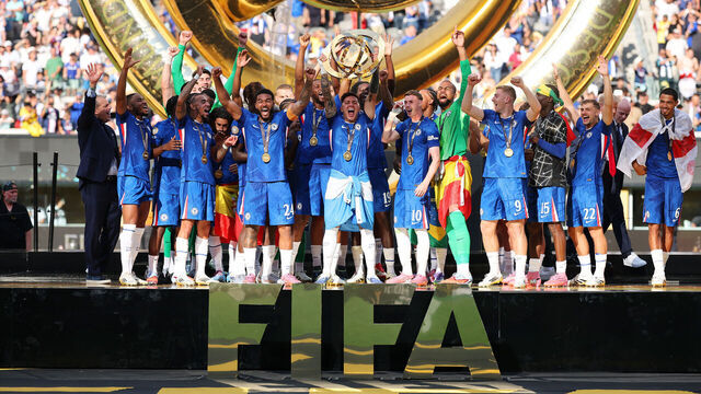 EAST RUTHERFORD, NEW JERSEY - JULY 13: Enzo Fernandez #8 of Chelsea FC lifts the FIFA Club World Cup trophy after his team's victory following the FIFA Club World Cup 2025 Final match between Chelsea FC and Paris Saint-Germain at MetLife Stadium on July 13, 2025 in East Rutherford, New Jersey.