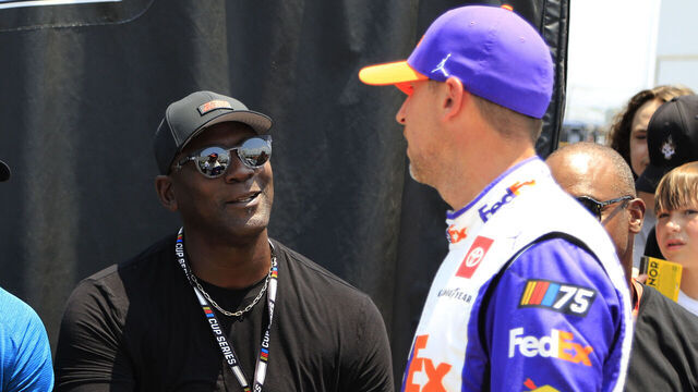 NASHVILLE, TN - JUNE 24: Team 23Xi co-owner Michael Jordan with Denny Hamlin (#11 Joe Gibbs Racing FedEx Ground Toyota) on pit road prior to qualifying for the NASCAR Cup Series Ally 400 on June 24, 2023 at Nashville SuperSpeedway in Lebanon, TN.