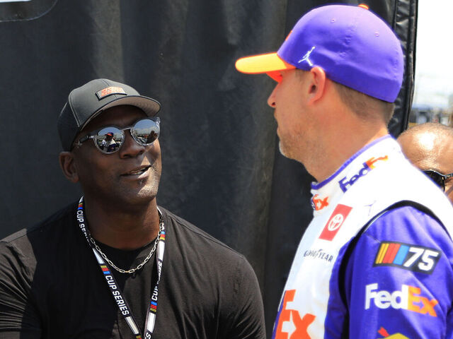 NASHVILLE, TN - JUNE 24: Team 23Xi co-owner Michael Jordan with Denny Hamlin (#11 Joe Gibbs Racing FedEx Ground Toyota) on pit road prior to qualifying for the NASCAR Cup Series Ally 400 on June 24, 2023 at Nashville SuperSpeedway in Lebanon, TN.