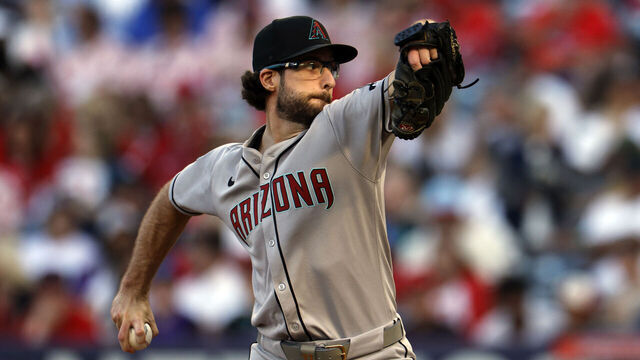 ANAHEIM, CALIFORNIA - JULY 12: Zac Gallen #23 of the Arizona Diamondbacks throws against Los Angeles Angels during the third inning of a baseball game at Angel Stadium of Anaheim on July 12, 2025 in Anaheim, California.