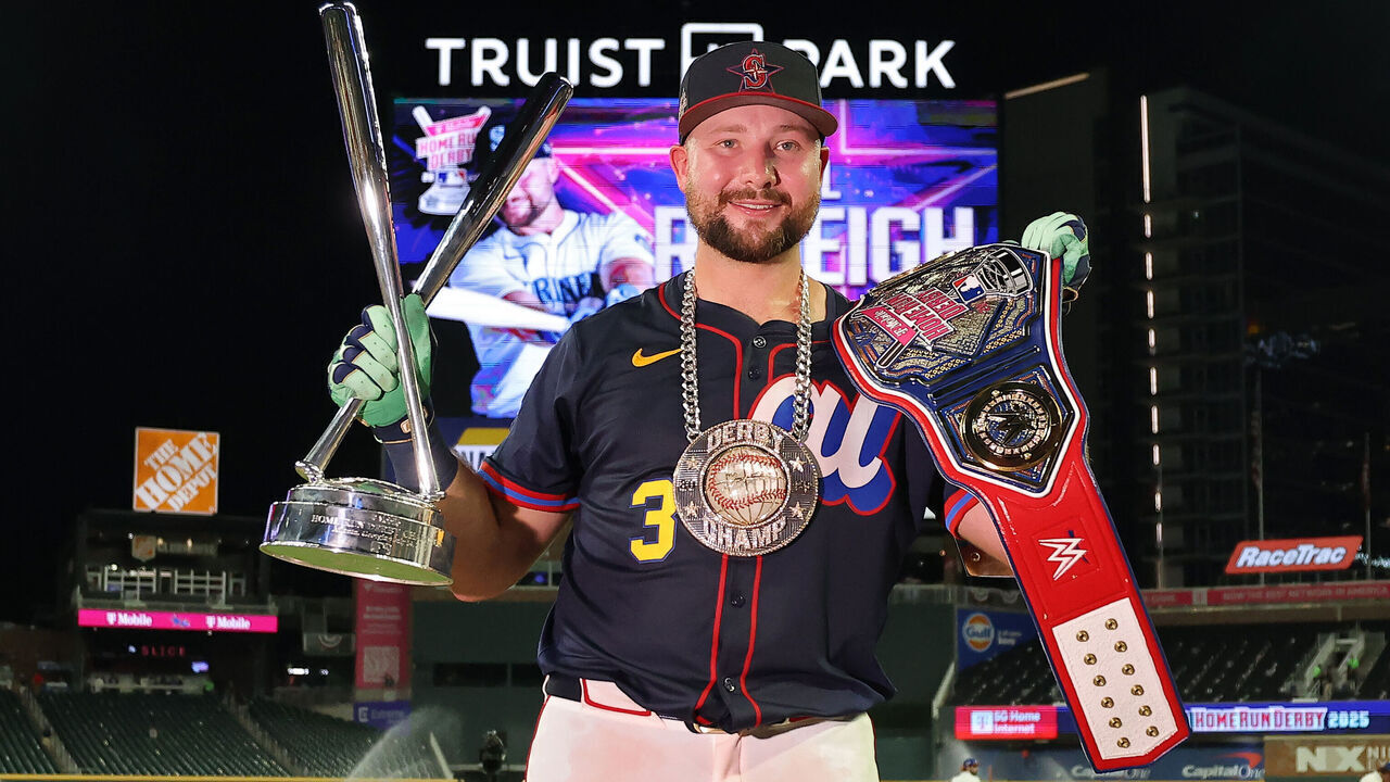 ATLANTA, GEORGIA - JULY 14: Cal Raleigh #29 of the Seattle Mariners poses with the trophy and belt after winning the Home Run Derby at Truist Park on July 14, 2025 in Atlanta, Georgia.